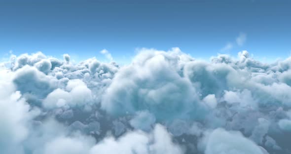 White fluffy clouds in blue sky