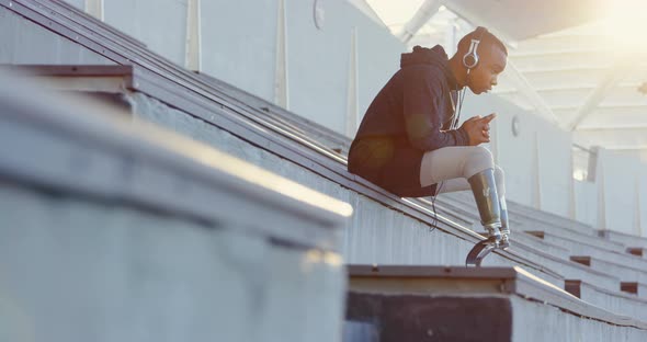 Disabled athletic sitting at sports venue 4k