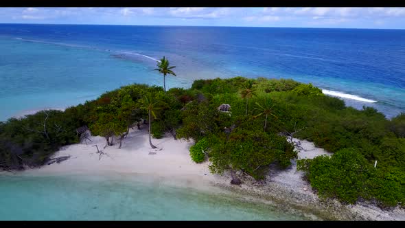 Aerial travel of marine island beach voyage by blue water with white sand background of a dayout nea