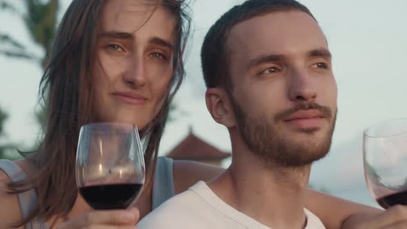 Man and Woman Drinking Wine Outdoors