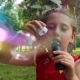 Little Girl Playing With Bubbles - VideoHive Item for Sale
