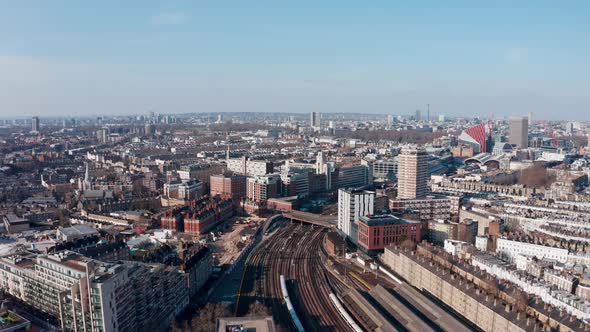 Aerial drone shot over Kensigton and Chelsea wealthy west London and victoria station