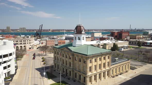 US Federal courthouse in Port Huron, Michigan with drone video pulling out.