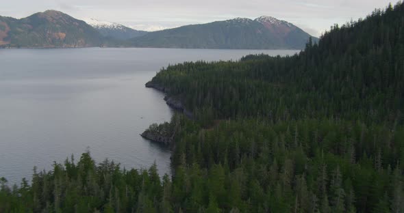 Aerial shot over mountainside at glacier, drone helicopter footage