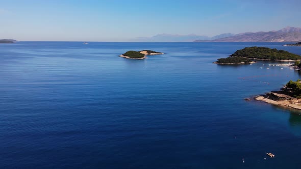 Flying Drone Over One of the Most Beautiful Beaches of Albania, Ksamil Beach, Albania.