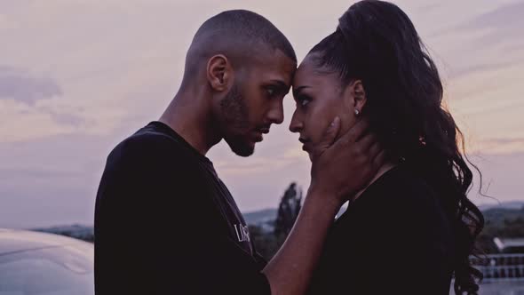 Black Couple looking at each other