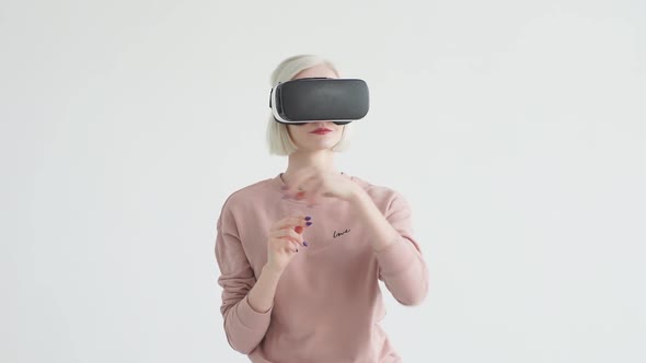 Future Is Now. Beautiful Young Female Playing Game in Vr Glasses