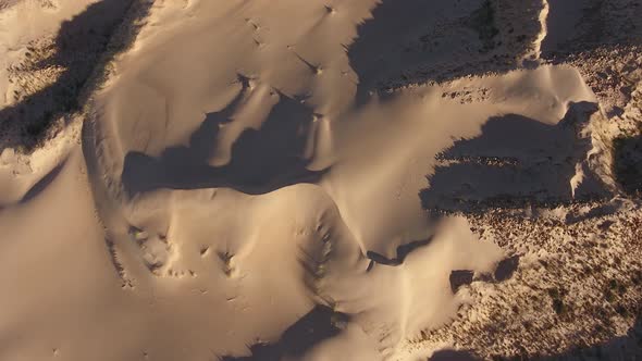 Aerial view of sand dune textures and shadows in the arid region of the Northern Cape, South Africa