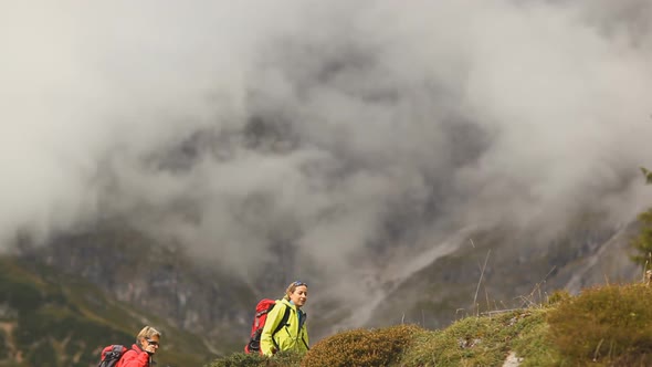 Hikers Walking Towards Camera