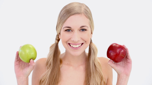 Happy Nude Blonde Holding Red And Green Apples
