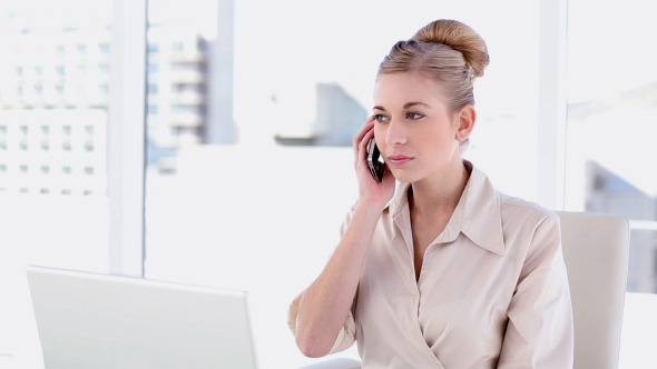 Content Blonde Businesswoman Phoning