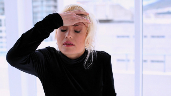 Beautiful Blonde Woman Having Headache