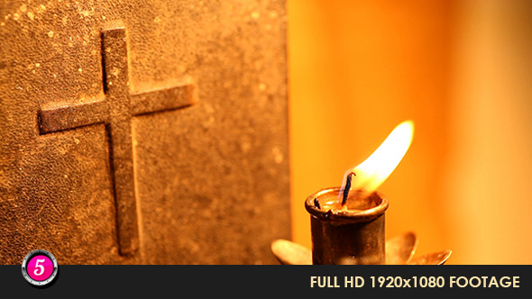 Candle With Holy Cross In Background