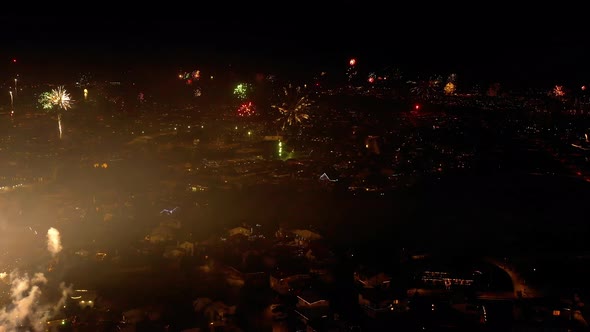 Colorful Fireworks Displayed On The Night Sky At The New Year’s Eve In Iceland. aerial