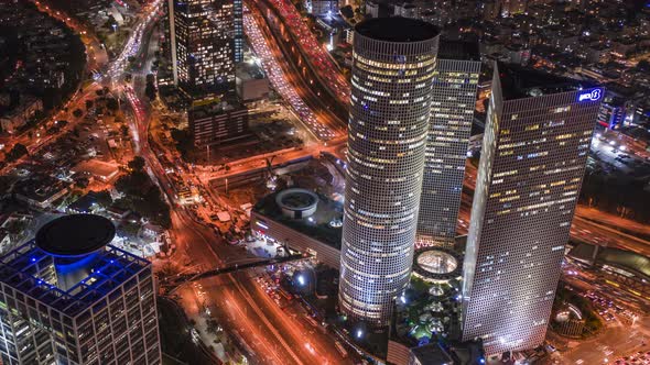 Night Tel Aviv business city center from birds view, Israel 4k aerial drone hyperlapse