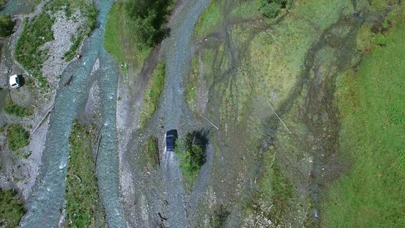 Suv Rides On A Mountain Road 5