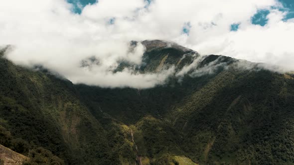 Cloud Canopy Over Tungurahua Volcano Near Town Of Baños In Ecuador. Aerial Shot