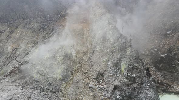 Aerial view fly through smoky in white crater, bandung, Indonesia