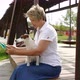 Small Dog Requires the Attention of the Owner Who Works on a Tablet - VideoHive Item for Sale