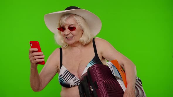 Senior Pensioner Woman Tourist Taking Selfie Portrait Photo Making Video Call on Mobile Phone