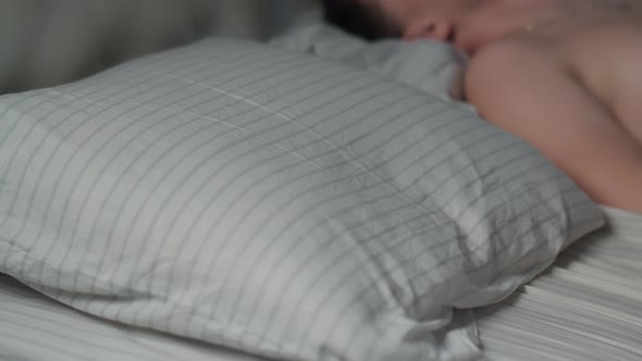 Happy Man and Woman Fall Into Bed on Pillow and Sleep at Home