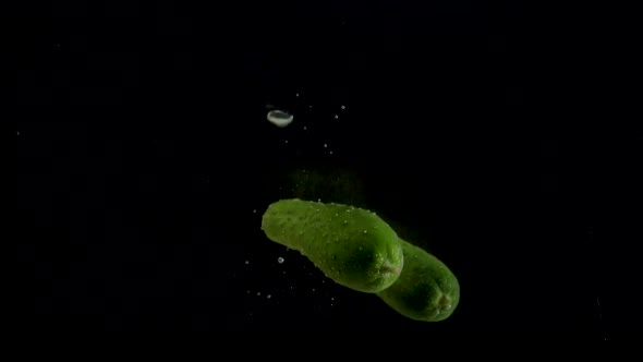 Cucumber Slow Motion Closeup Falling in Water