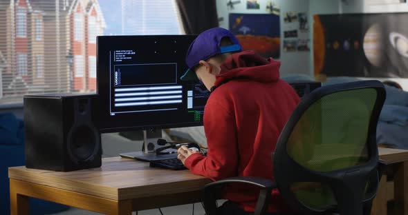 Programmer Boy Coding on His Computer