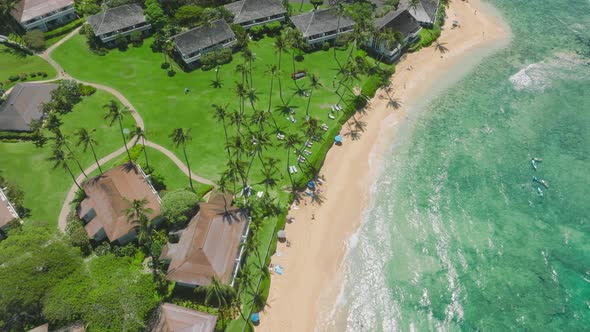 Aerial  View of Poipu Kauai Island Showing Luxury Resort and Clear Blue Beach