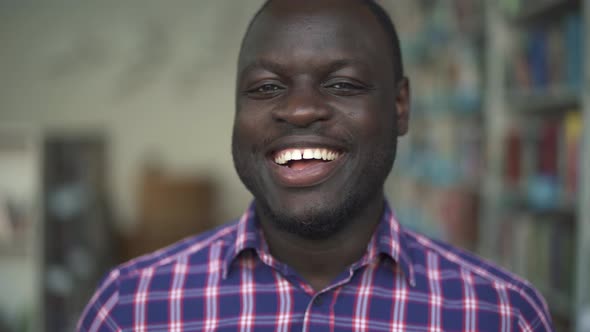 African American Male Smiling Looking in Camera