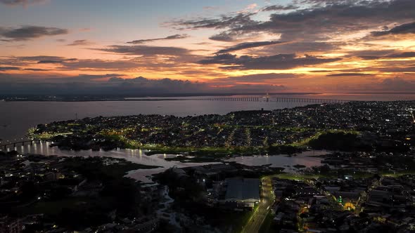 Sunset sky over downtown Manaus Brazil. Cityscape tourism landmark.