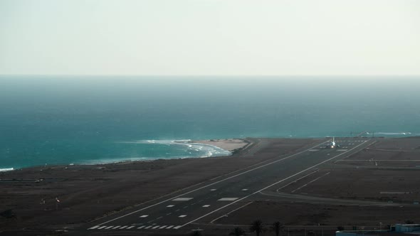 Departure of a Passenger Plane From an Island Airport