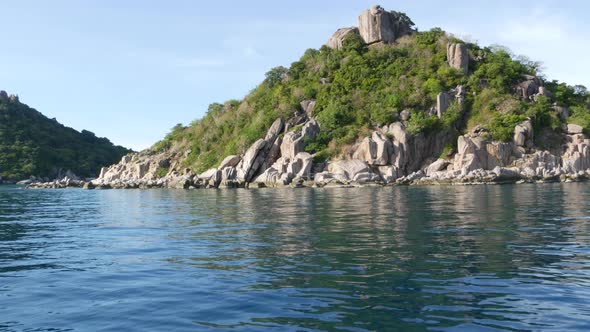 Calm Water Near Green Tropical Exotic Paradise Island. Tranquil Sea Water Near Diving Resort on