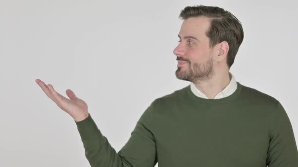 Portrait of Man Holding Product on Hand White Screen