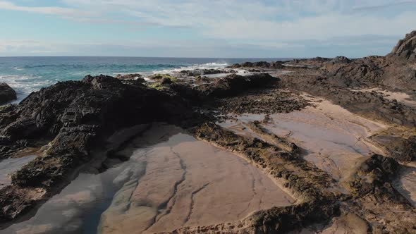 Flying over the tide pools in Porto das Salemas