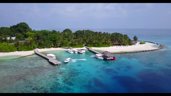 Aerial view travel of beautiful coast beach adventure by blue green sea and white sandy background o