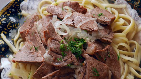 Etnic Kazakh Food  Beshbarmak Meat with Noodles