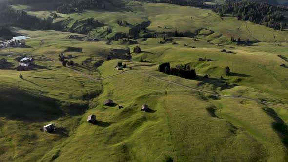 Drone Flying Forward Revealing Majestic Seiser Alm Meadows in Dolomites Italy