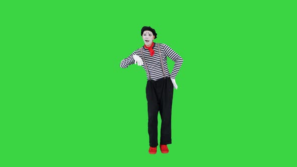 Mime Pretending To Be Drunk Having Two Shots of Imaginary Drink on a Green Screen Chroma Key