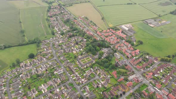 Aerial footage of the UK British town of Wheldrake located is in the City of York, West Yorkshire UK