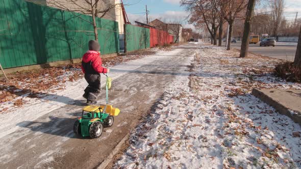 Boy Running On Winter Sreet Slow Motion