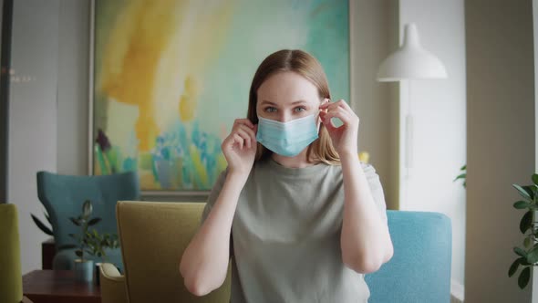 Happy Positive Girl Young Beautiful Woman Takes Off Protective Medical Mask From Face Smiling