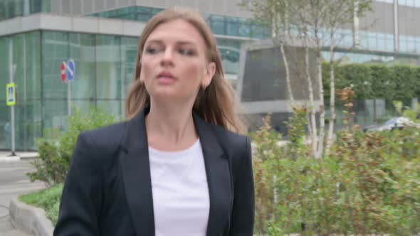 Close Up of Young Businesswoman Walking on the Street Slow Motion