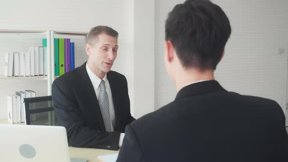 Young asian businessman job interview with manager and successful at the office.