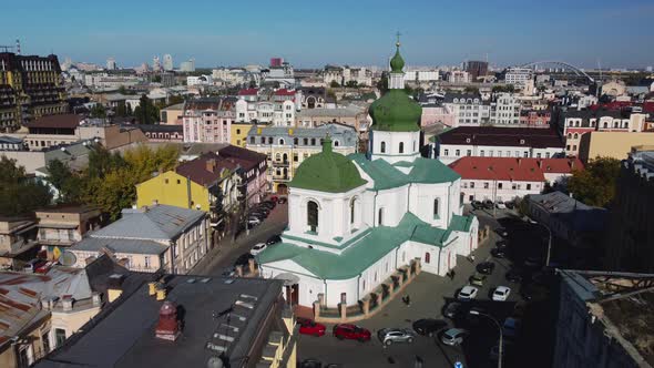 Aerial view of Church of St. Nikolay Pritisk and historical part of Kyiv - Podil