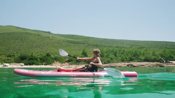 Kid on Paddle Board