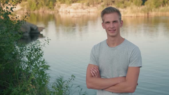 Portrait of Young Guy at Lake