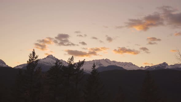 wide panoramic shoot of a winter mountain ridge during sunset