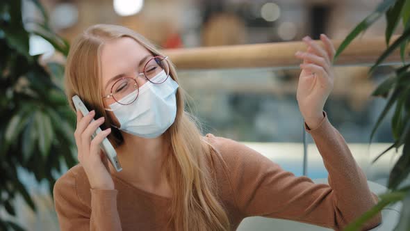 Happy Caucasian Young Woman Glasses and Medical Protective Mask Talking on Phone Carefree Girl Chat