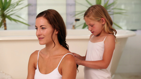 Little Girl Plaiting Her Mothers Hair 1