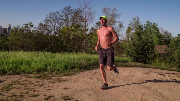 Athletic Male Trail Running Slow-Motion